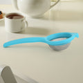 Kadak stainless steel mesh tea strainer with plastic handle on white background