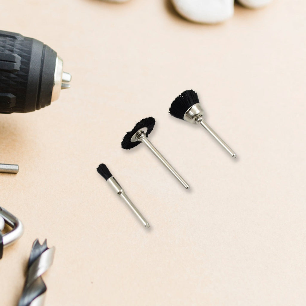 Pen-shaped brass wire brush attachment for precision cleaning with a drill.