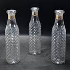 Close-up of the translucent diamond cut water bottles, highlighting their durable plastic.