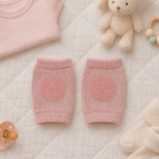 Side view of toddler pink wool knit knee protectors with cushion pads