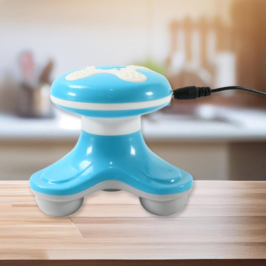 The triangle design massager providing soothing vibrations on an arm muscle.