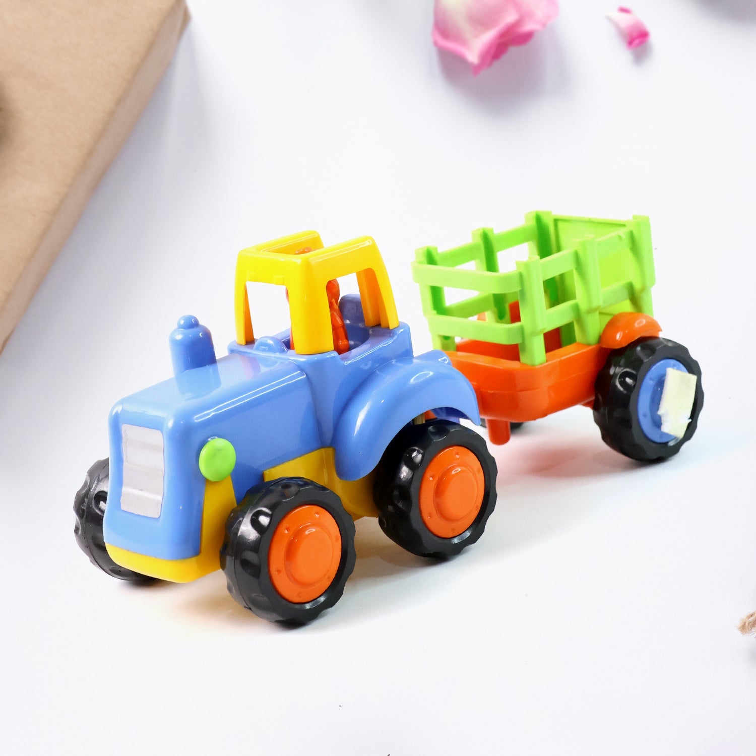 Set of four toy construction vehicles in a colorful play set for kids