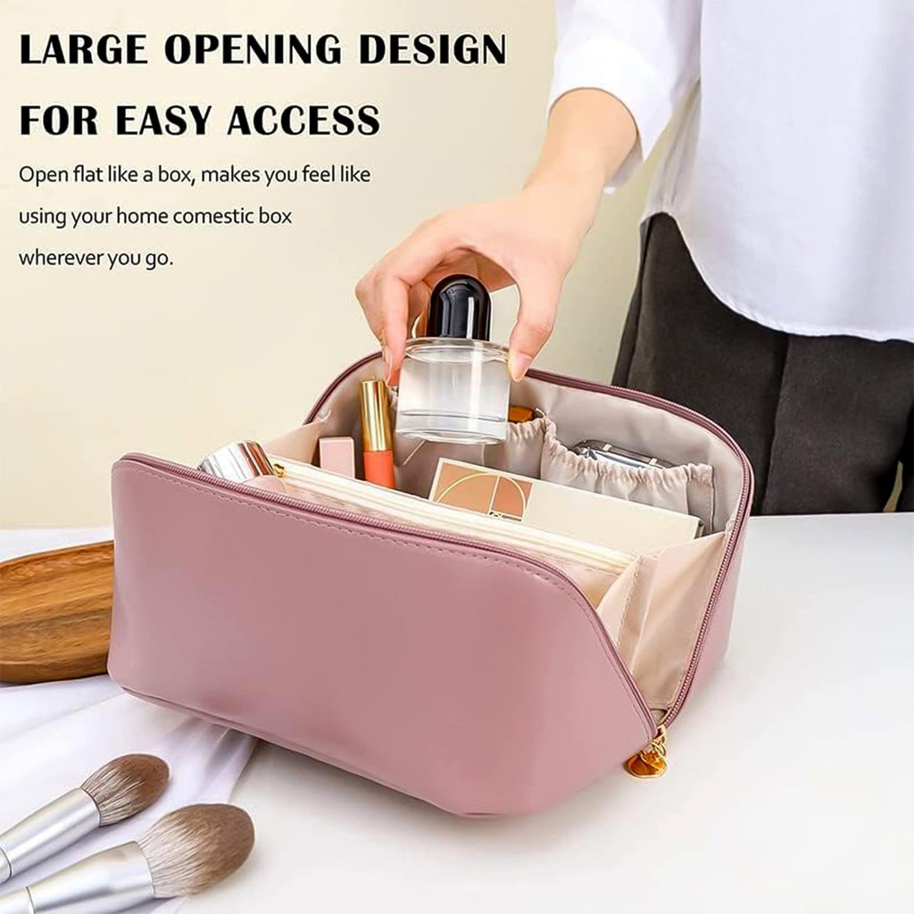 Front view of travel makeup pouch in peach with zipper and handle