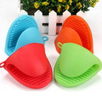 Two durable silicone potholders in red, ideal for kitchen cooking and baking.