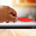 Red plastic knives set with ergonomic design for comfortable grip