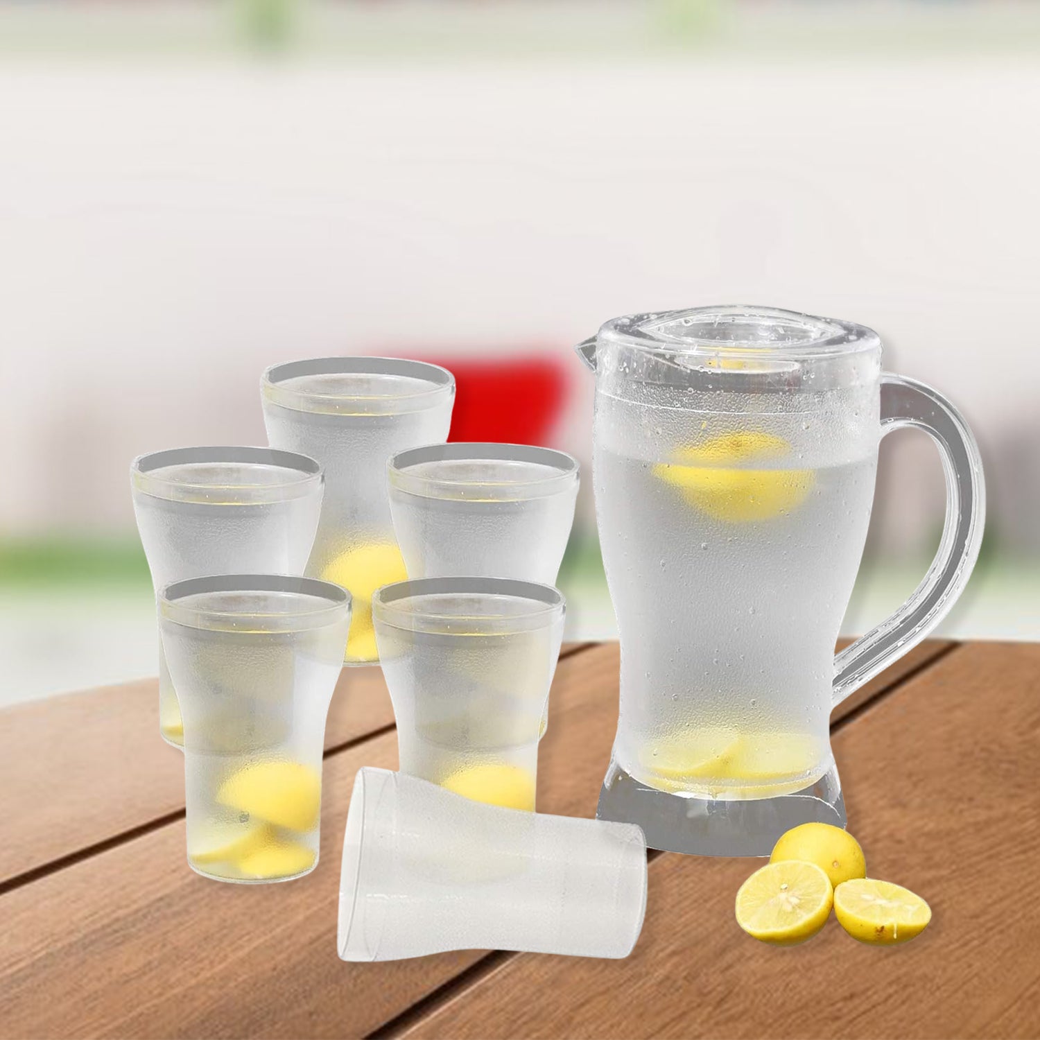 Clear unbreakable lemon jug and matching glasses for home and outdoor use