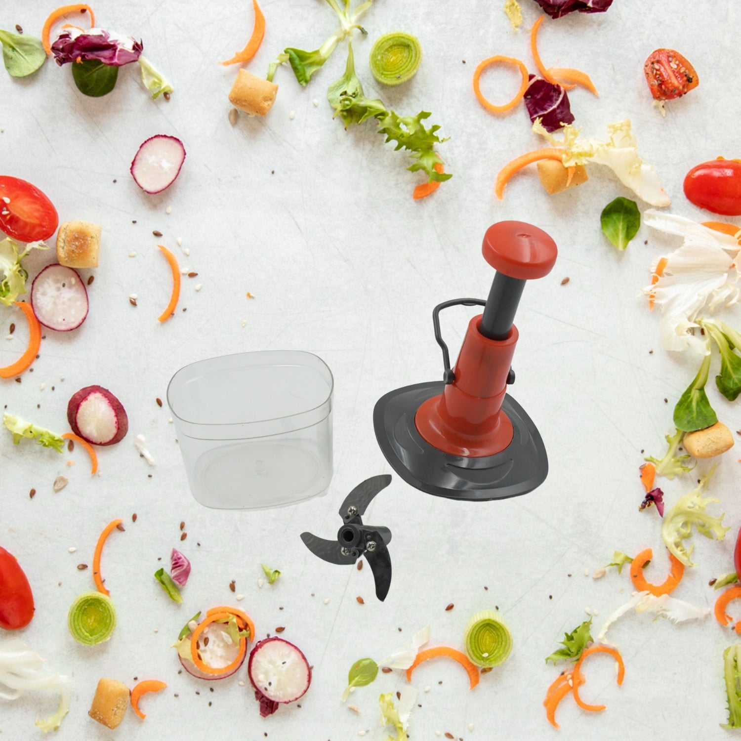 The 650ml manual food chopper disassembled, showing the stainless steel blades and container.