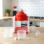 Manual ice snow maker in red, ready to create fluffy shaved ice for golas.