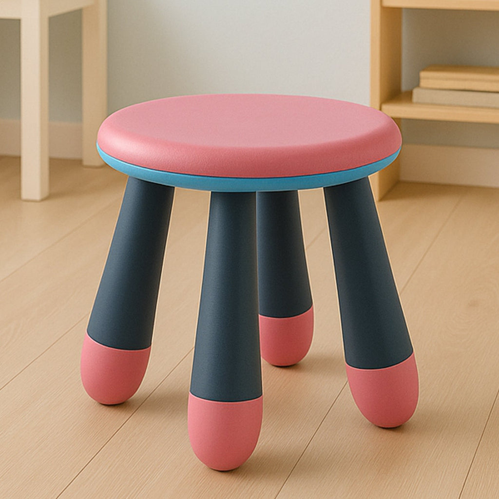 A young child seated comfortably on the Bub Barrier foldable baby stool.