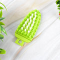 Plastic fruit and vegetable cleaning brush with flexible bristles
