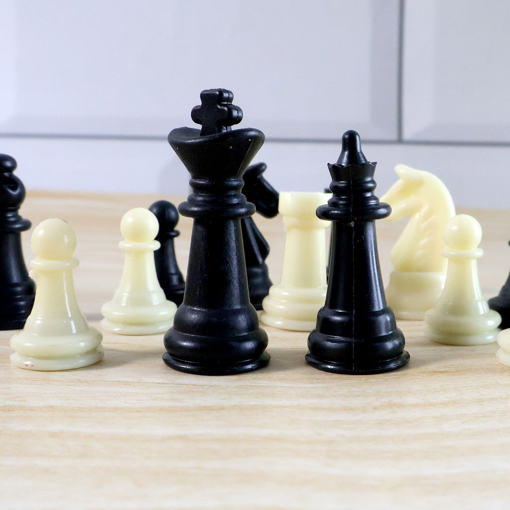 Open foldable magnetic chess board set showing pieces and board