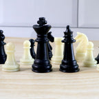 Open foldable magnetic chess board set showing pieces and board