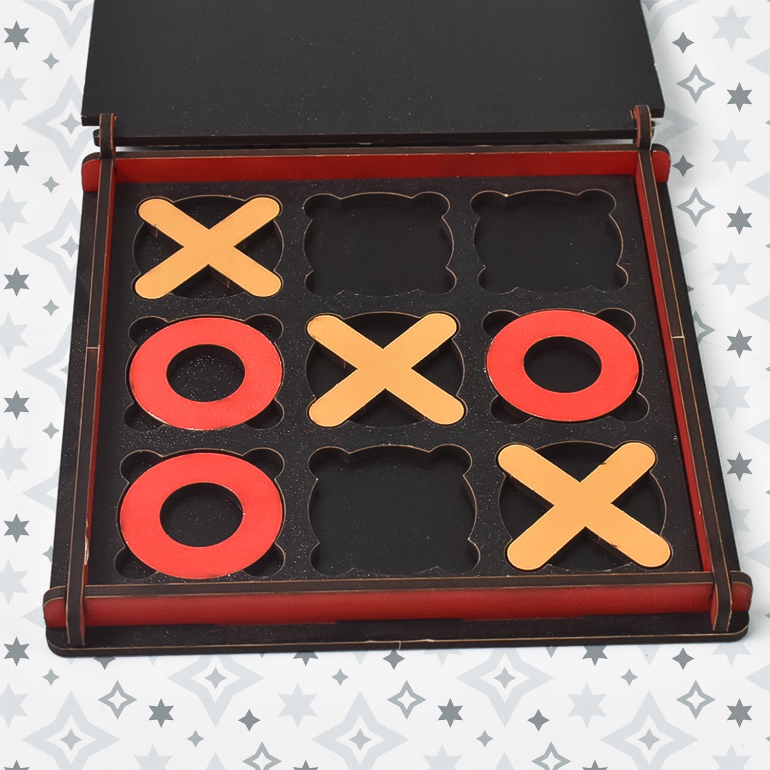 Side view of the compact wooden Tic Tac Toe game, highlighting its portability.
