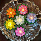 Floating Lotus LED Candles, flameless and safe, enhancing a home's festive decor.