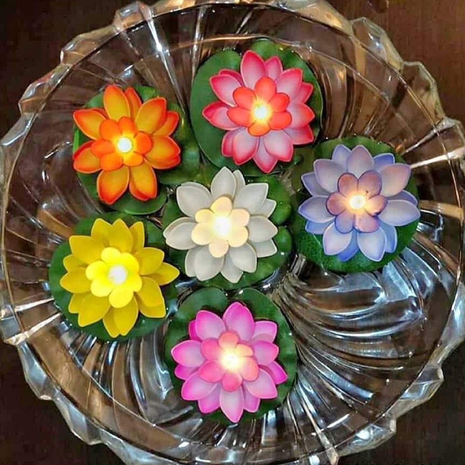 Floating Lotus LED Candles, flameless and safe, enhancing a home's festive decor.