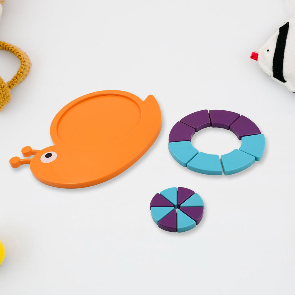 A child proudly displays their completed Snail Puzzle for Kids.