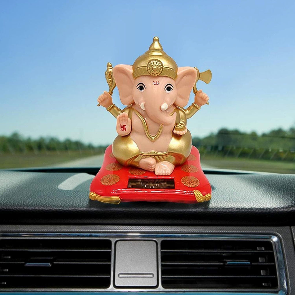 Front view of decorative Ganesh murti elegantly displayed on solar base