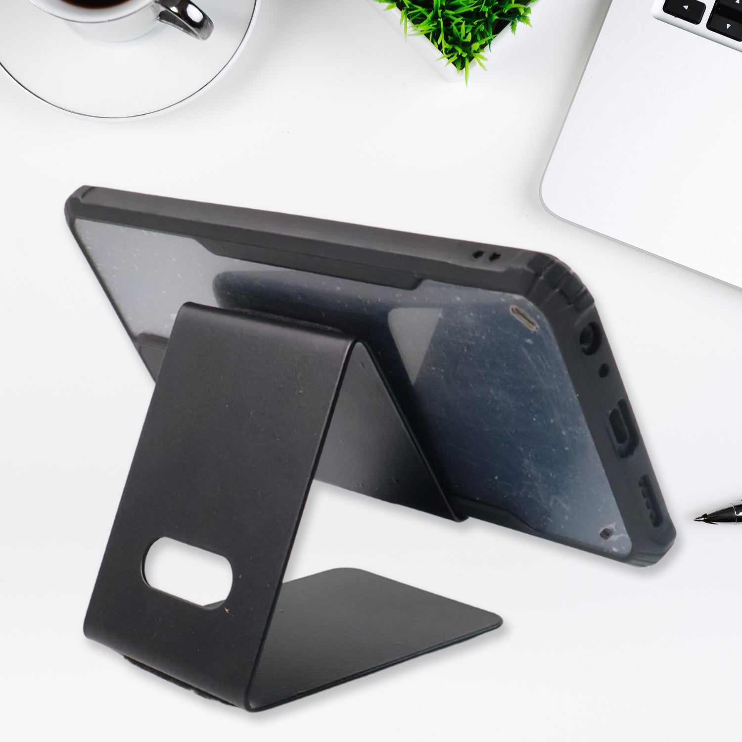Mobile stand holding a smartphone securely with anti-slip pads visible