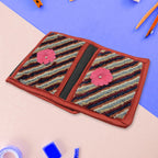 Wall hanging letter holder neatly organizing documents and magazines.
