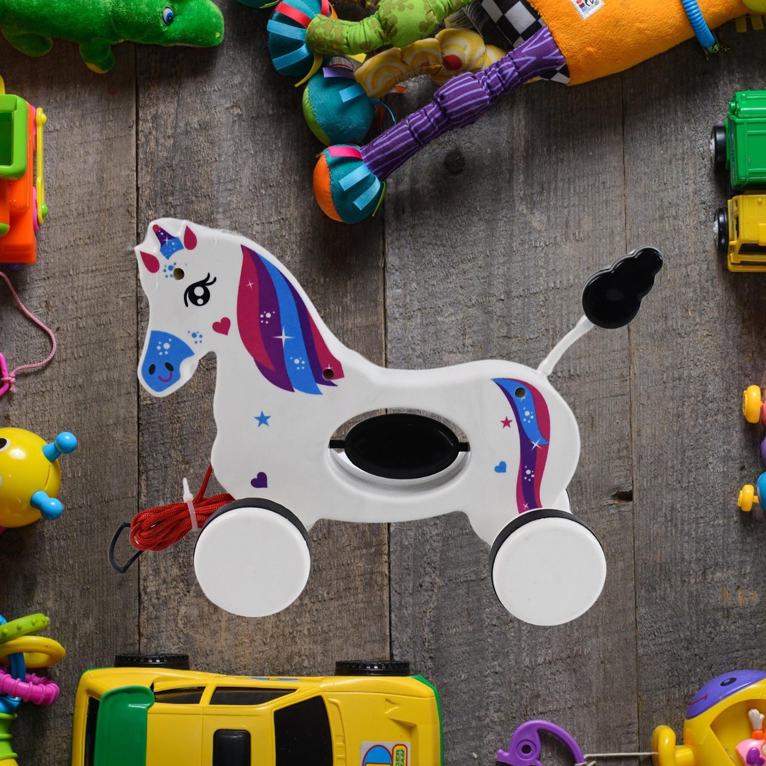 Rear view of the Unicorn pull along toy highlighting the durable pull string