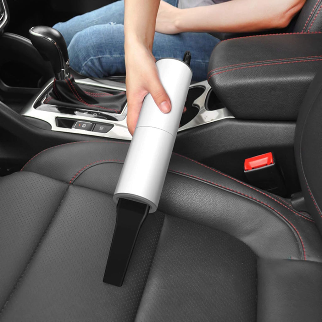 Portable car vacuum cleaner displaying all included nozzles and brush attachments.