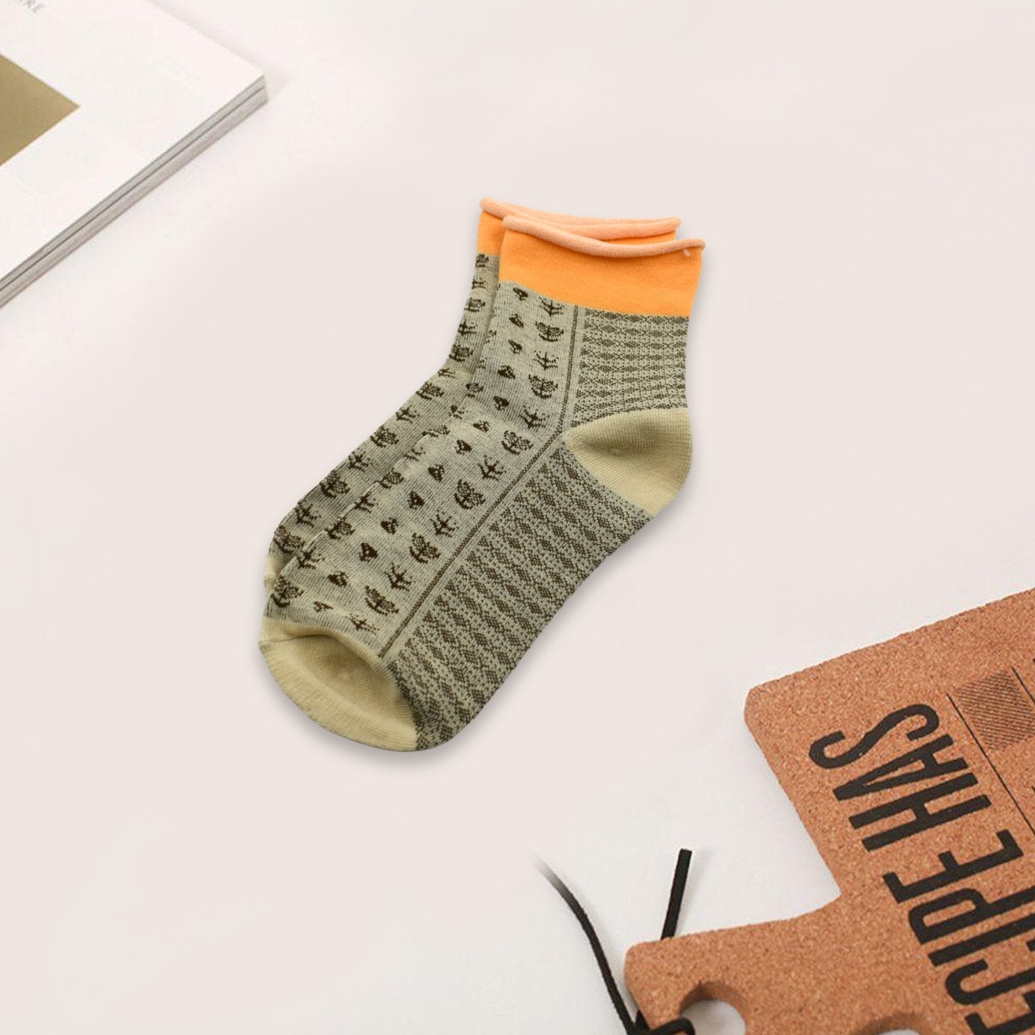 Top-down view of grey cotton ankle socks, perfect for breathable comfort.