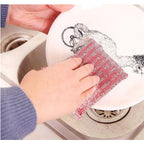 Multiple scratch-proof scrub pads stacked, ready for utensil cleaning.