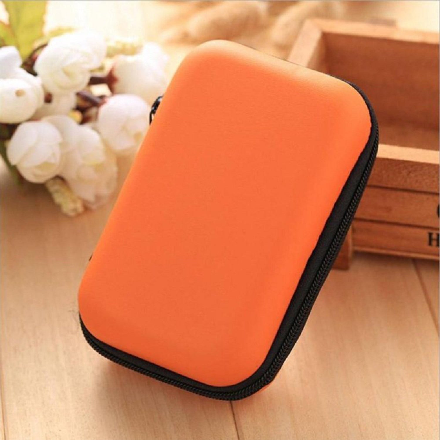 Portable storage case with sleek hard shell design
