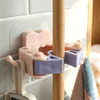 Strong adhesive broom and mop holder clip gripping cleaning tool handle