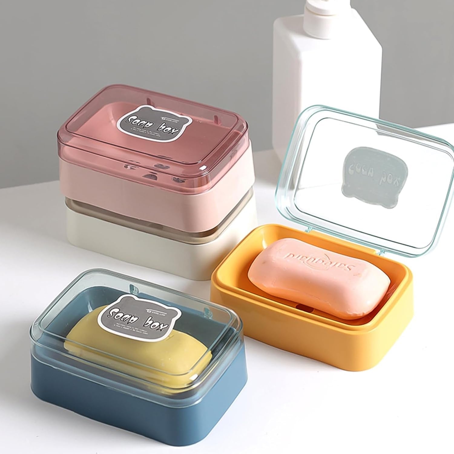 Vibrant colored portable soap dish, highlighting its compact size.