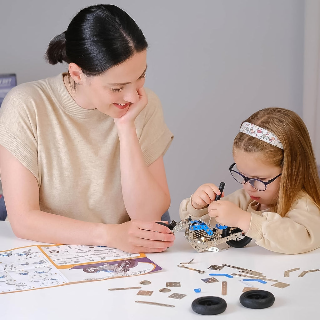 Close-up of the detailed, high-quality metal parts included in the DIY engineering kit.