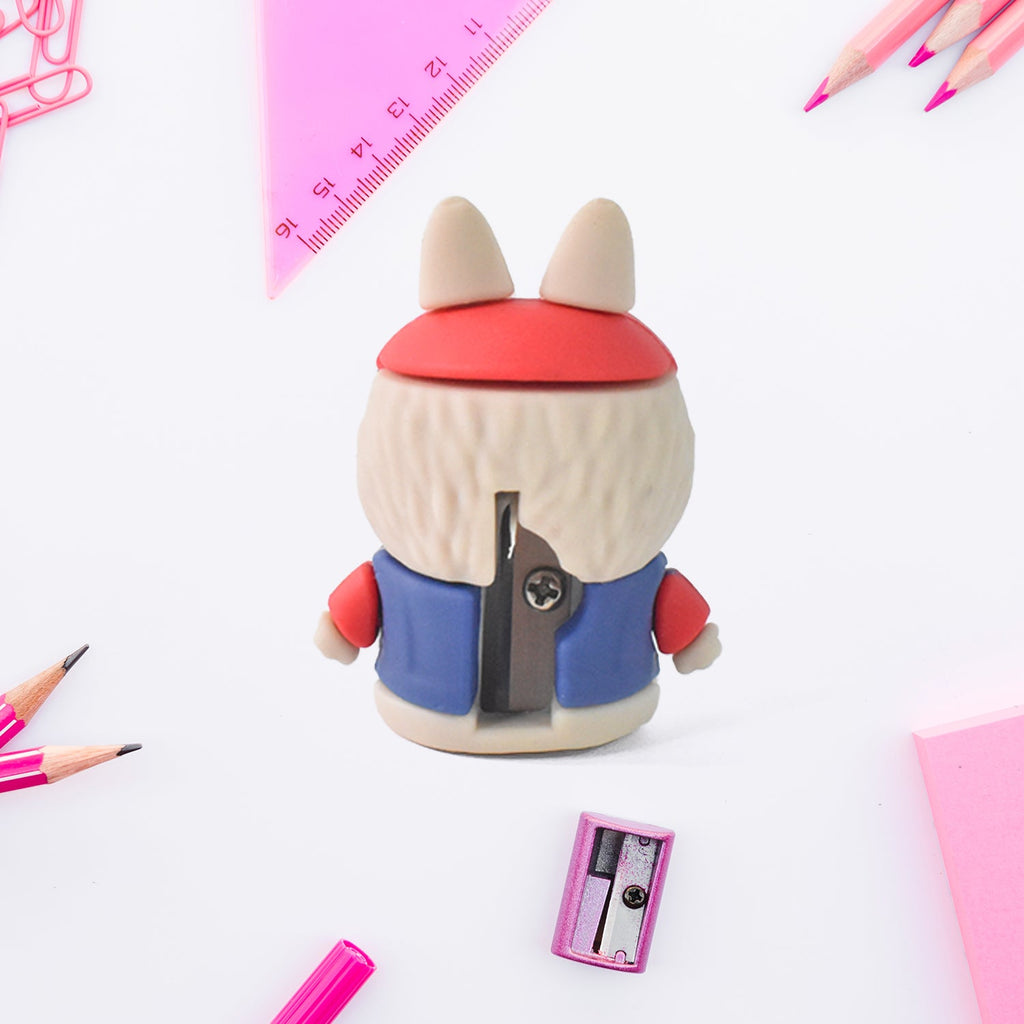 Close-up of blue cartoon pencil sharpener with built-in eraser tool