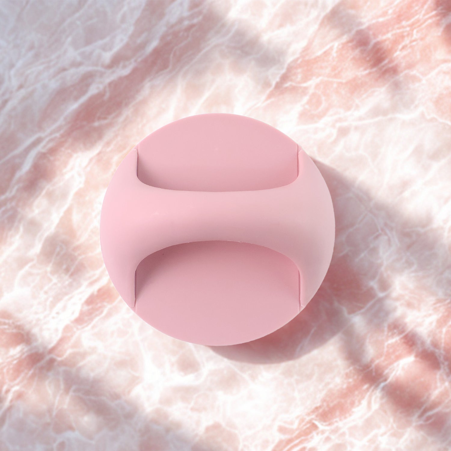 Self-adhesive plastic handle grip displayed on white background