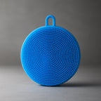 Silicone dish scrubber making kitchen cleanup effortless.