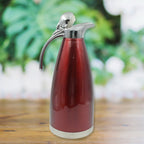 Sleek stainless steel vacuum insulated kettle jug, 2L, keeping drinks hot or cold.