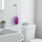 Compact lavender scent toilet freshener hanging in bathroom