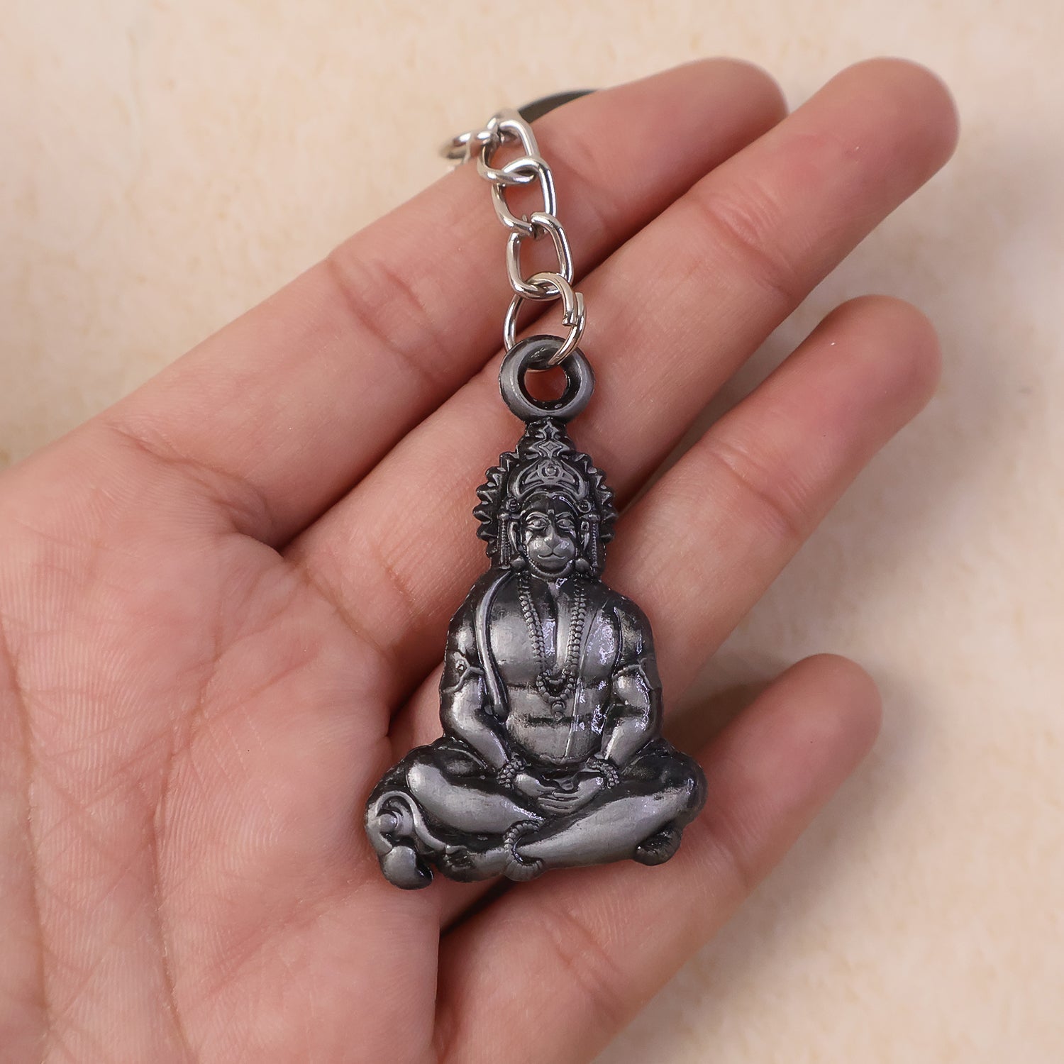 Hanuman Ji sitting pose keychain attached to keys