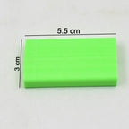 A playful cartoon eraser in a bright colour, showcasing its detailed design.