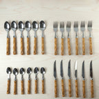Kitchen spoon and fork set in stainless steel
