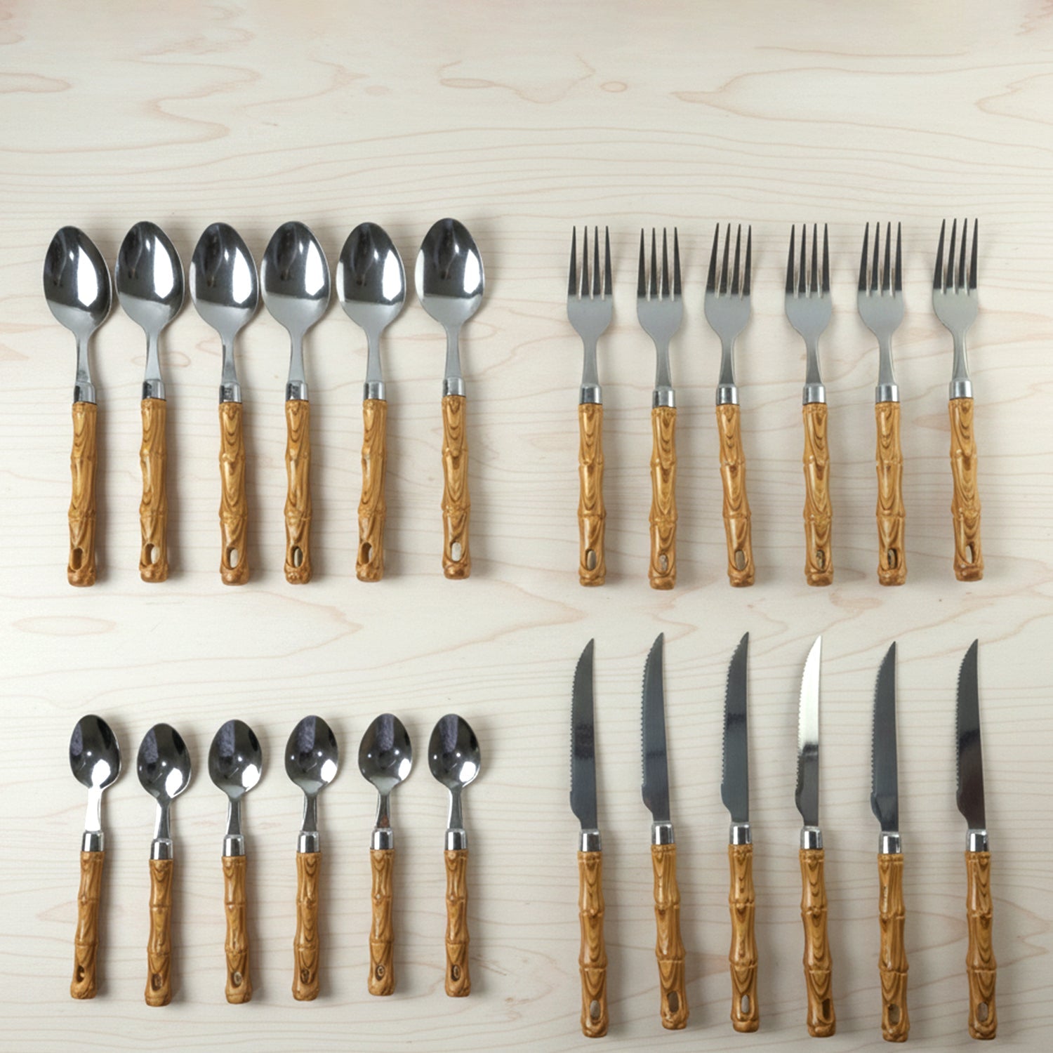 Kitchen spoon and fork set in stainless steel