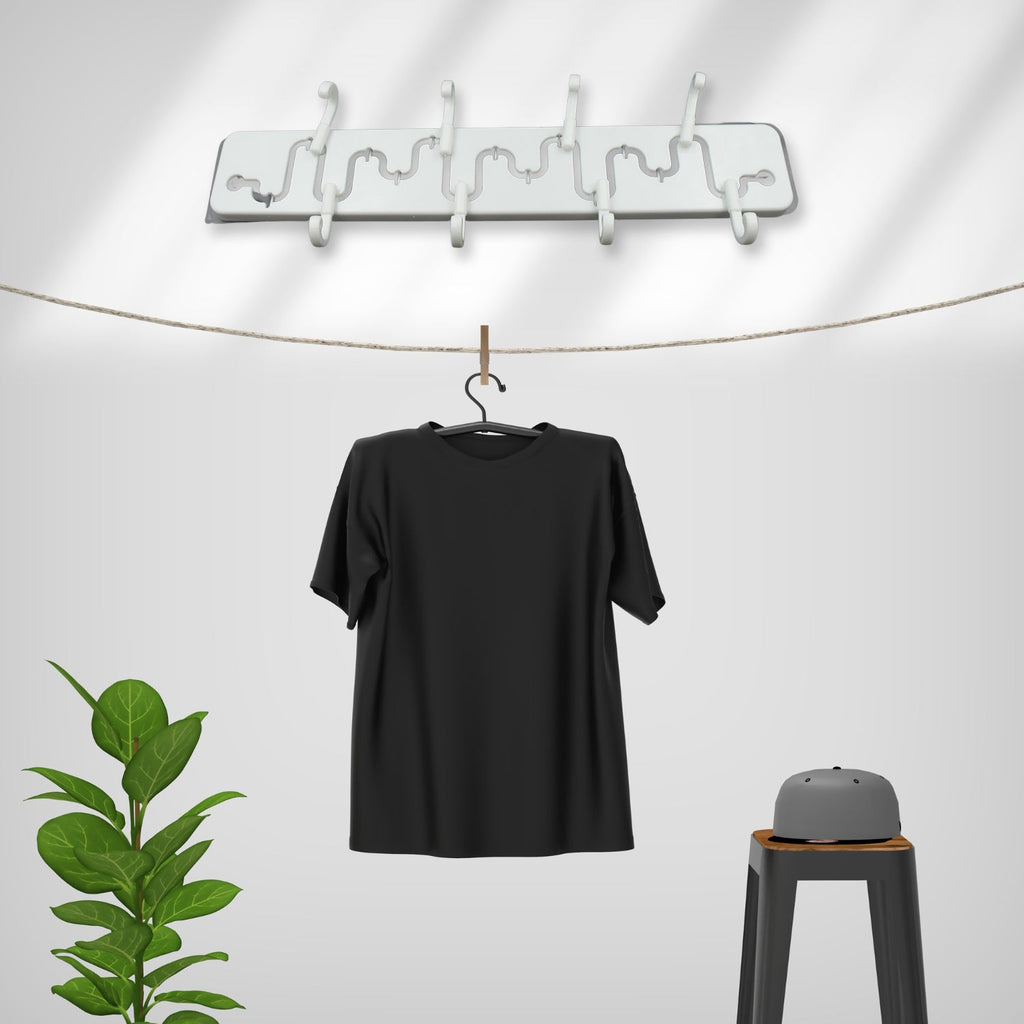 Adjustable wall hook holding various kitchen utensils, showcasing its versatility.
