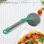 The durable stainless steel wheel of the Quickslice pizza cutter, showcasing its sharpness.