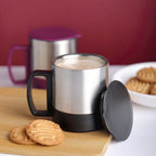 Side view of the durable stainless steel coffee mug with a comfortable handle.