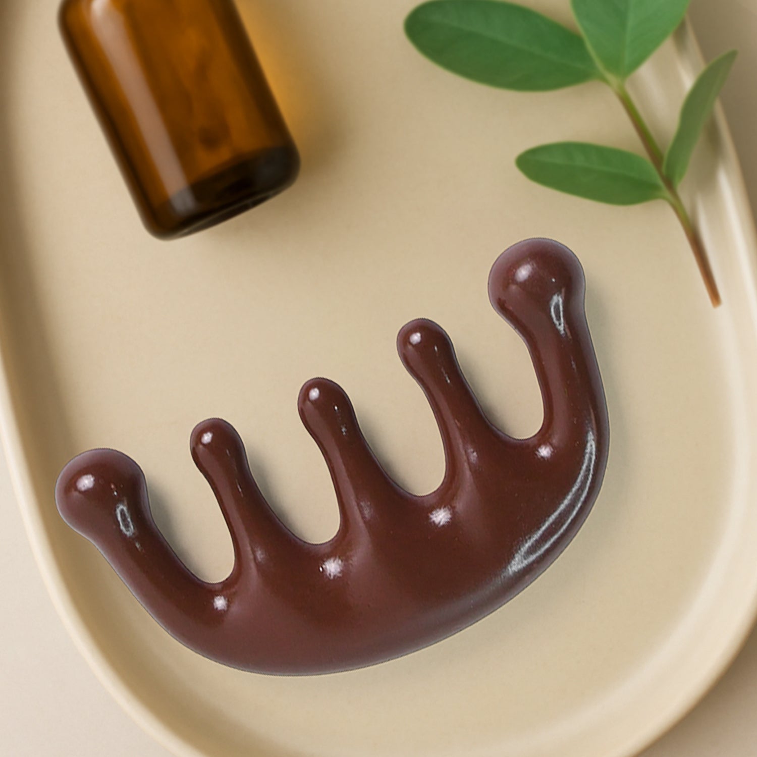 Close-up view of durable scalp relaxing manual head massager comb