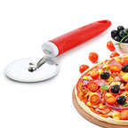 Ganesh pizza cutter in action, smoothly slicing a freshly baked pizza.