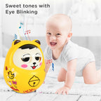 Side view showcasing the design of the musical roly poly wobbling toy