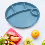 Jiaqi 5-compartment kids plate with spoon on a rustic wooden table.