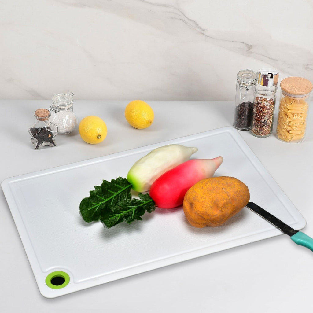 Handy and lightweight plastic chopping board, an indispensable tool for kitchen tasks.