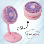 Side profile of the portable fan, highlighting its adjustable head for directional airflow.