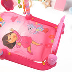 Happy baby playing on the Aditi Baby Play Gym Mat with colorful toys.
